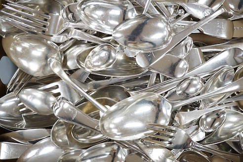 A quantity of assorted 18th century and later silver flatware various dates, makers and patterns, including table spoons, table forks, dessert forks teaspoons, butter knife etc. and an 800 teaspoon